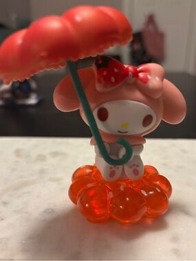 Sanrio My Melody Figure with Red Umbrella and Orange Base
